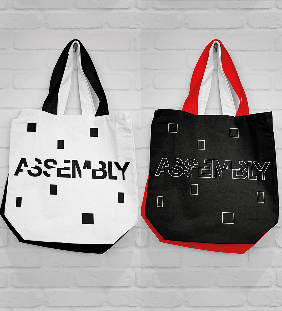 shopping bags with the word assembly on it and floating black rectagles